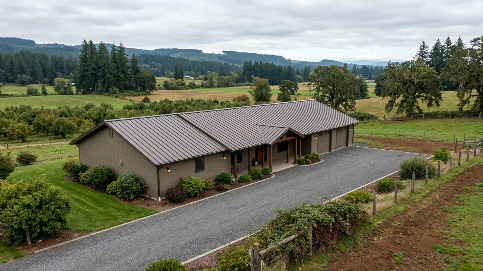 A completed single-story barndominium with a long, low roofline and no upper-level windows.